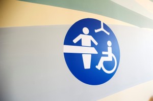 Assisted changing sign
