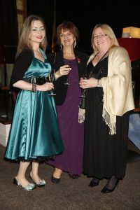 vonne Crowhurst from Wirral Autistic Society (centre) celebrates winning the title of Best Care Trainer at the North West heats of the Great British Care Awards. Pictured here with (from left) colleagues Yvonne Smith and Jane Carolan